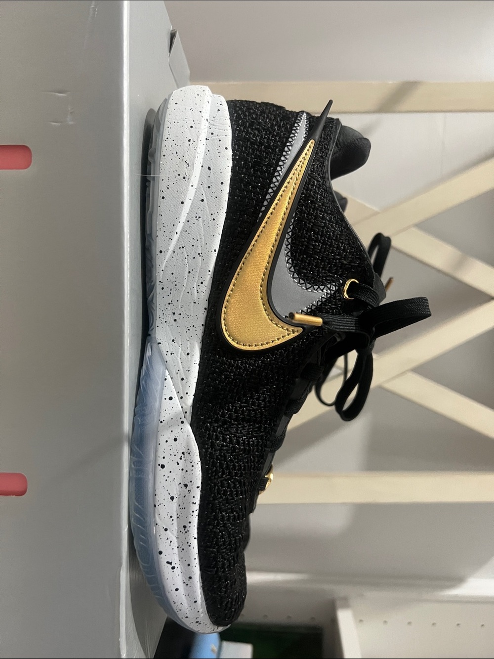 Nike men’s Black & Gold LeBron 20 black and gold basketball shoes